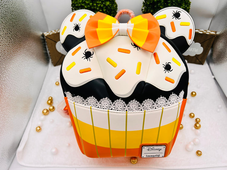 Loungefly Exclusive Disney Minnie Candy Corn Cupcake Glow Mini Backpack