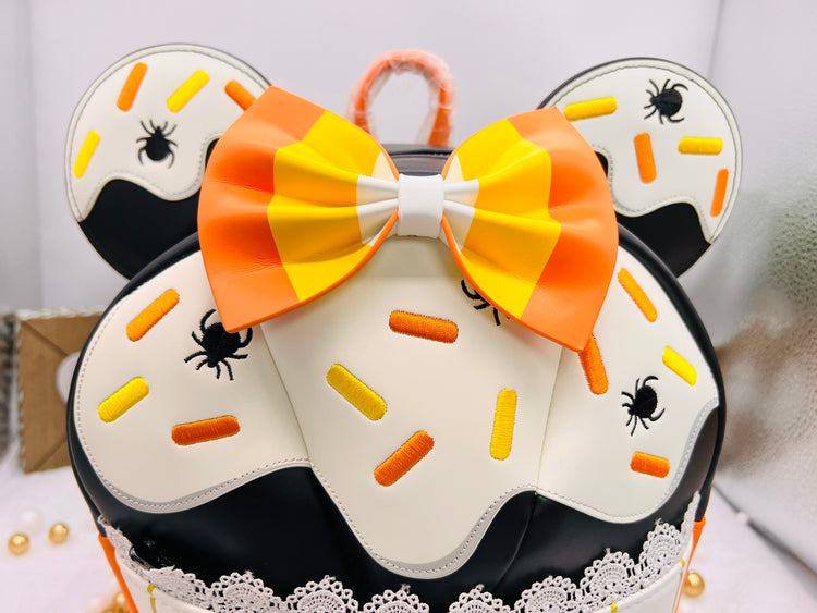 Loungefly Exclusive Disney Minnie Candy Corn Cupcake Glow Mini Backpack