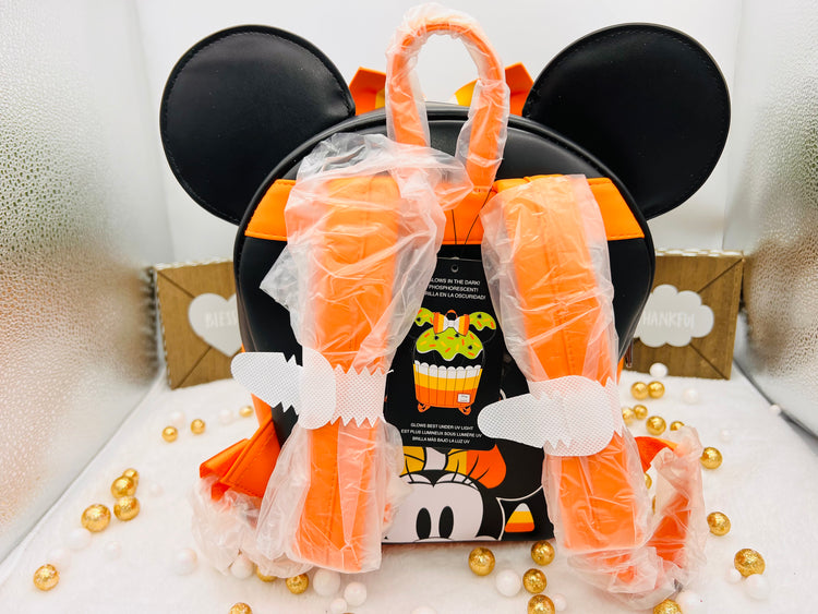 Loungefly Exclusive Disney Minnie Candy Corn Cupcake Glow Mini Backpack