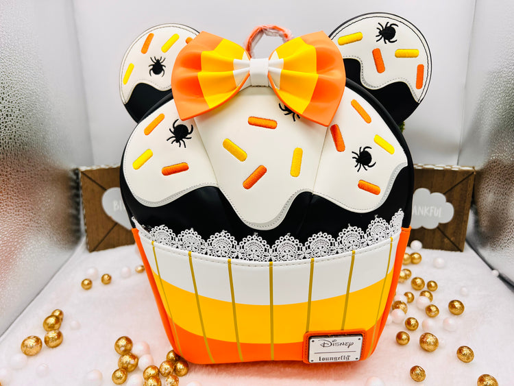 Loungefly Exclusive Disney Minnie Candy Corn Cupcake Glow Mini Backpack