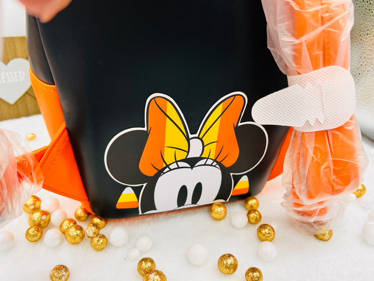 Loungefly Exclusive Disney Minnie Candy Corn Cupcake Glow Mini Backpack