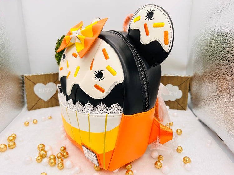 Loungefly Exclusive Disney Minnie Candy Corn Cupcake Glow Mini Backpack