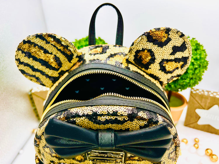 Loungefly Disney Parks Minimochila con lentejuelas de leopardo