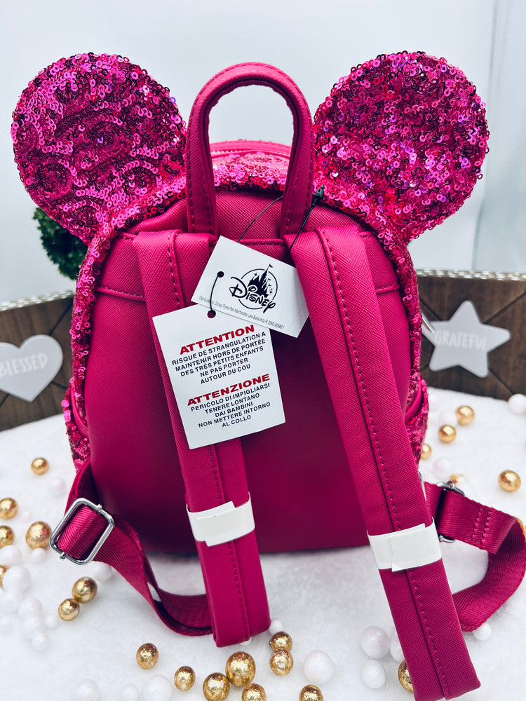 Minimochila Loungefly con lentejuelas de Minnie Mouse – Magenta