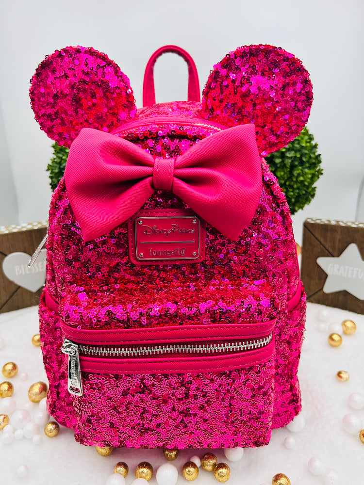 Minimochila Loungefly con lentejuelas de Minnie Mouse – Magenta