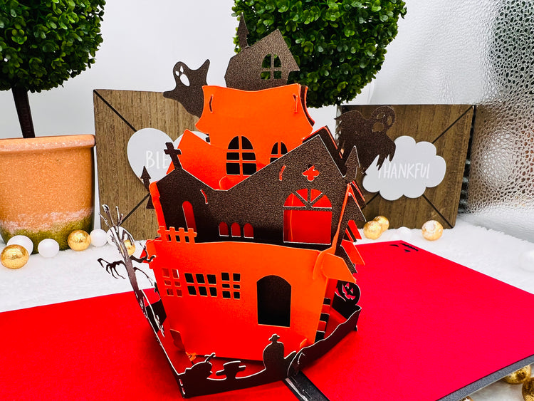 Tarjeta emergente de casa embrujada 3D hecha a mano
